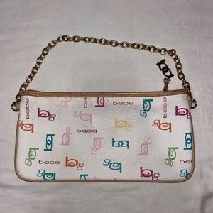 Bebe clutch in good condition with some scratches